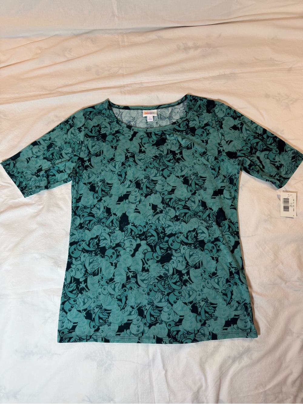 LuLaRoe Big Kid Teal and Dark Teal Short Sleeve Frozen/Olaf Top